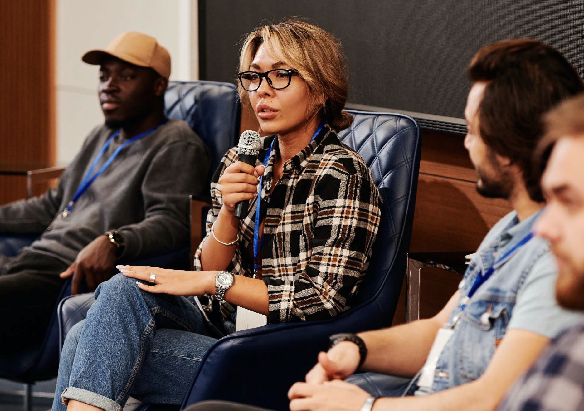 Woman with microphone in audience